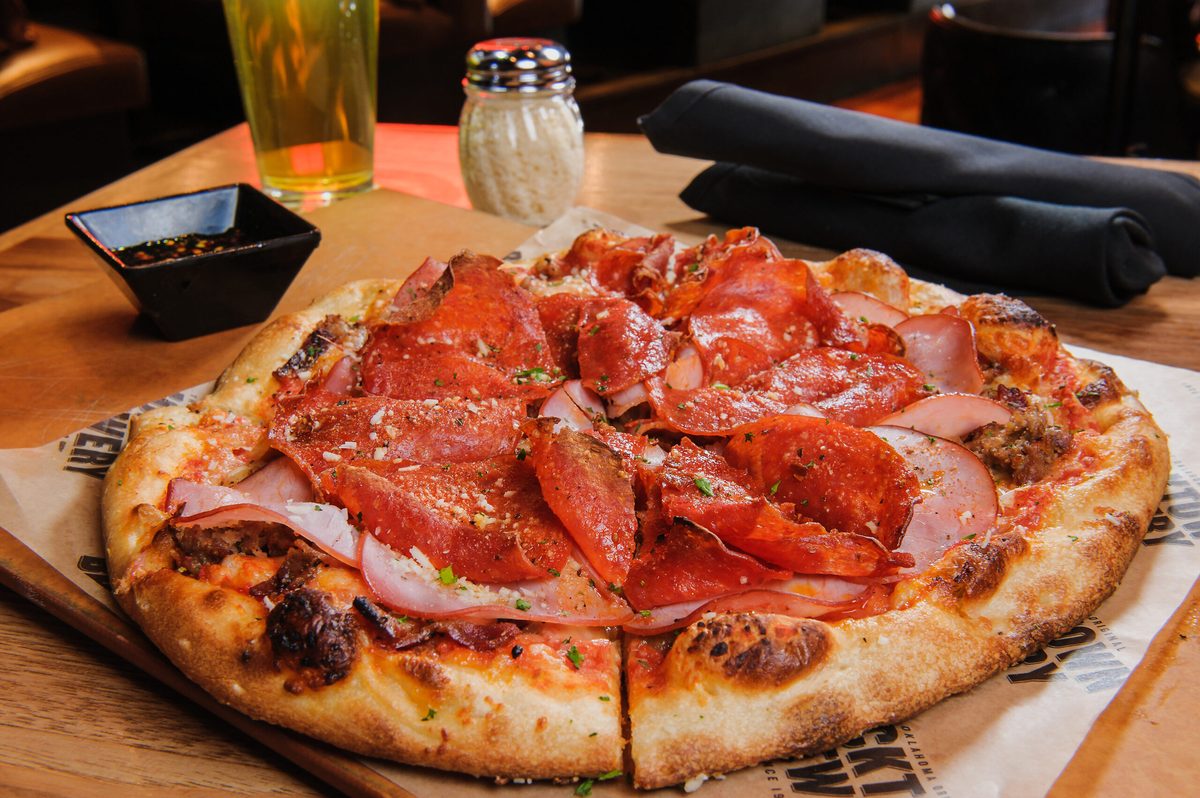 A loaded pizza at Bricktown Brewery