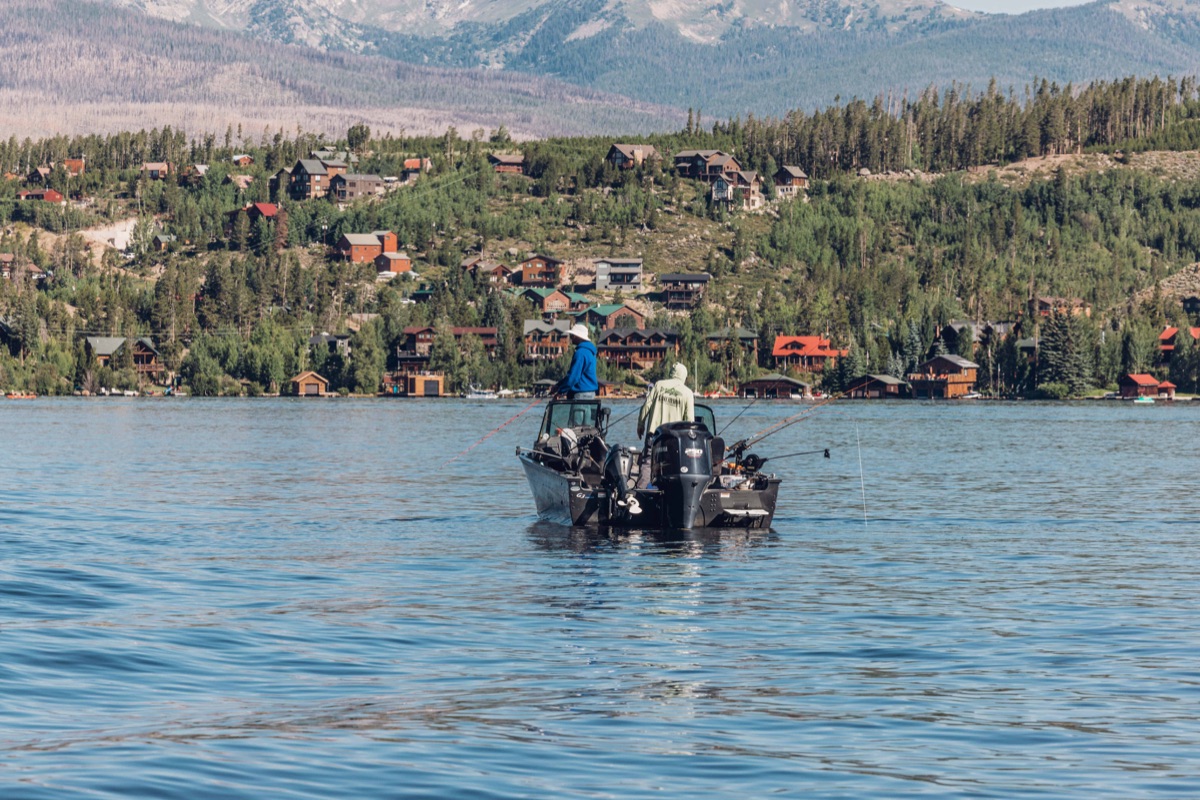 Anglers fishing from a boat on Grand Lake