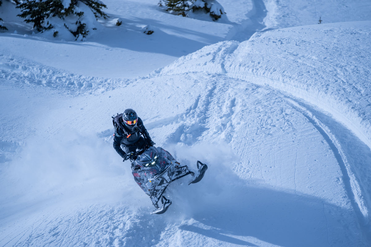 Snowmobiling on the trails around Grand Lake