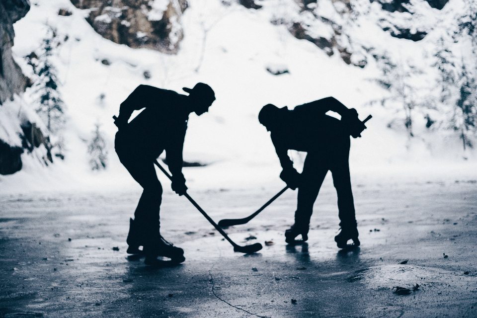 Illustrative photo of skaters on outdoor natural ice
