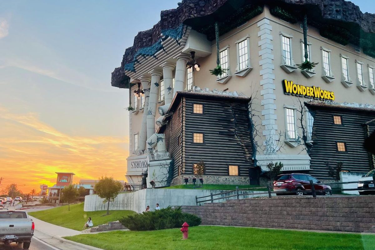 The upside-down WonderWorks building at sunset in Branson